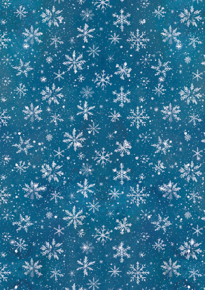 Pattern of white snowflakes on a blue background